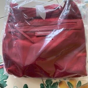 NEW IN PACKAGE!  LONGCHAMP Le Pliage Nylon/Leather Crossbody Bag/Purse- RED!!
